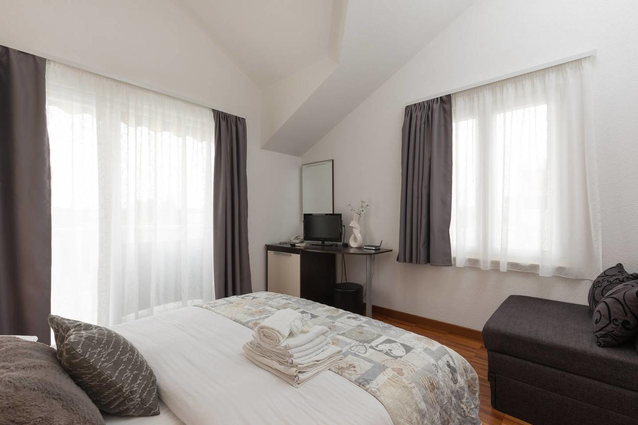 Apartments & Rooms Villa Maslina Trogir Bagian luar foto